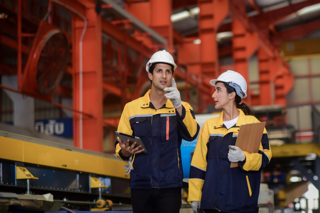 Arbeitsbekleidung Bremen - Mitarbeiter in Arbeitsbekleidung